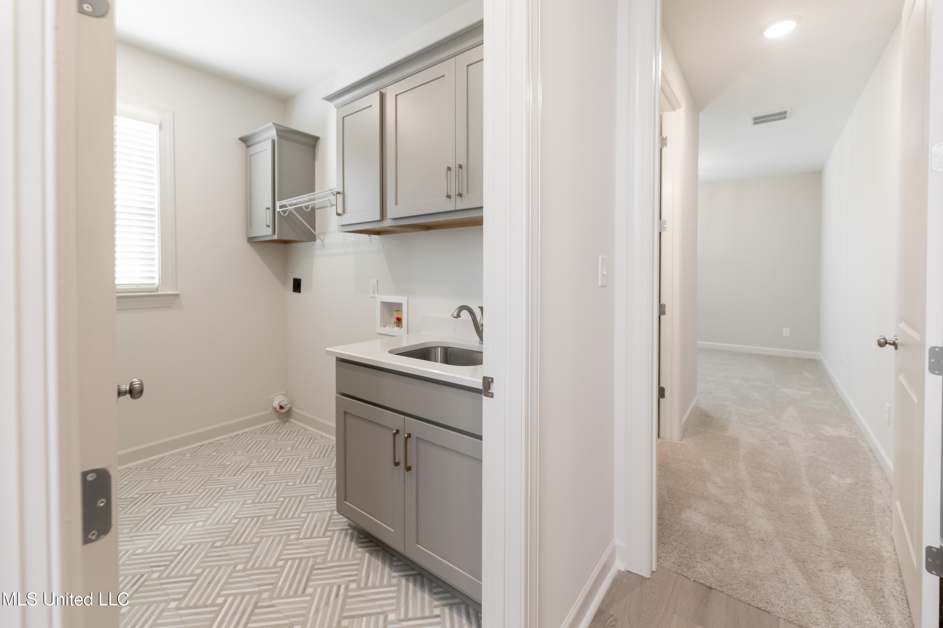 7019 Scarlett Street Olive Branch, MS 38654 - Photo 25 of 32 Laundry Room