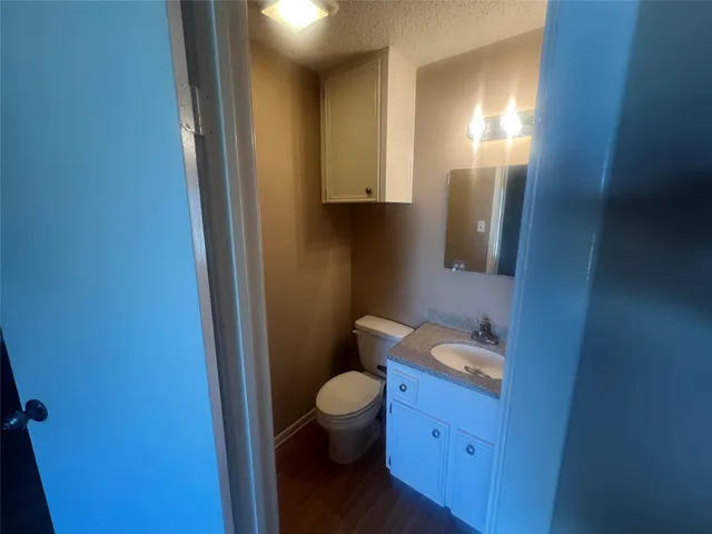 a bathroom with a toilet and a sink