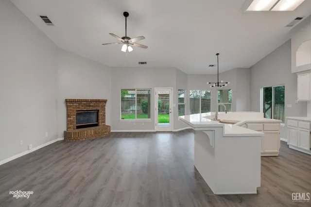 a view of kitchen with stainless steel appliances refrigerator oven and stove