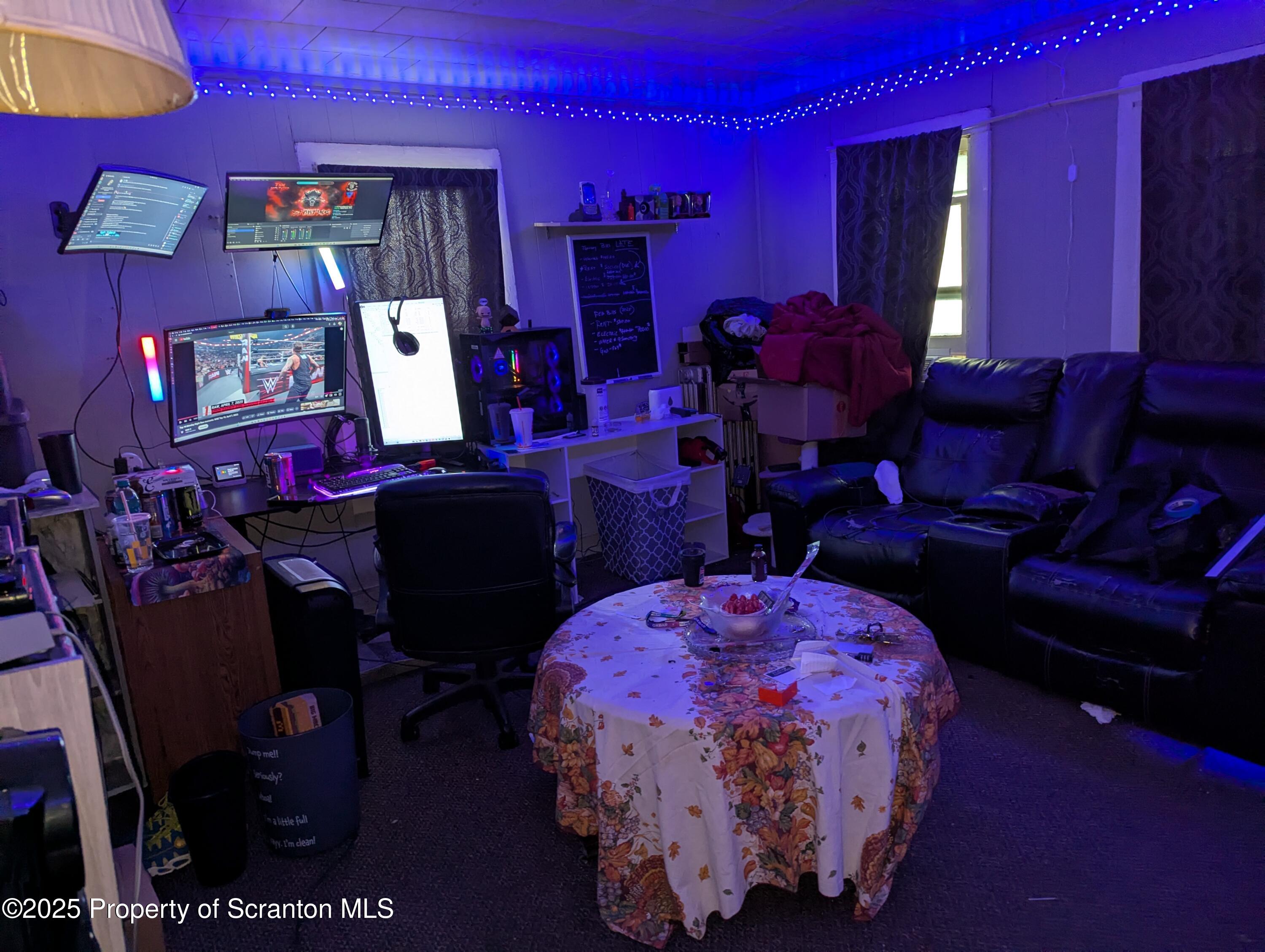 846 Capouse Avenue Scranton, PA 18509 - Photo 11 of 35 a bed room with a bed window and dresser
