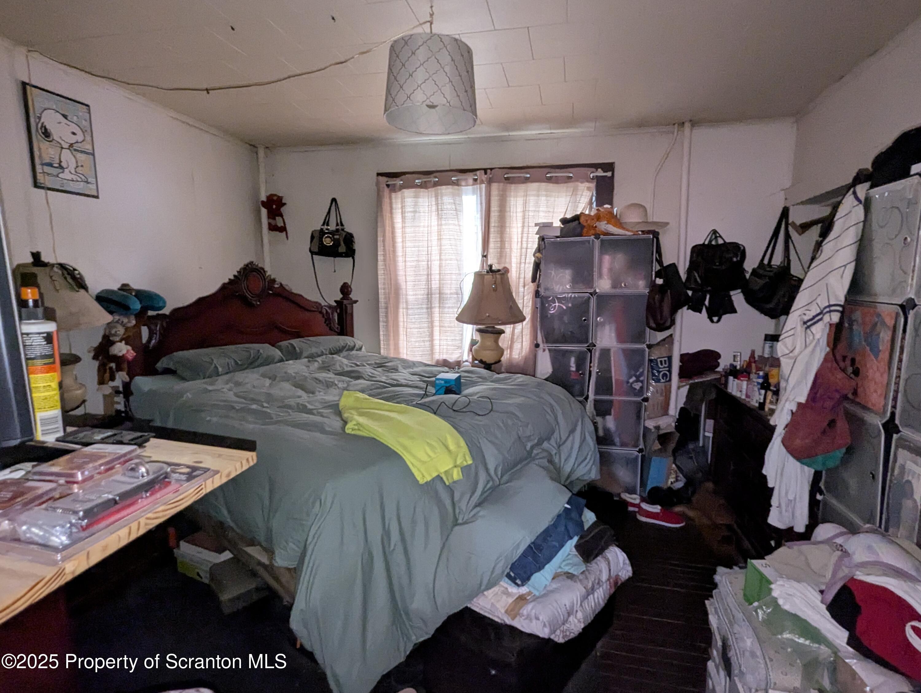 846 Capouse Avenue Scranton, PA 18509 - Photo 15 of 35 a bedroom with bed and a window