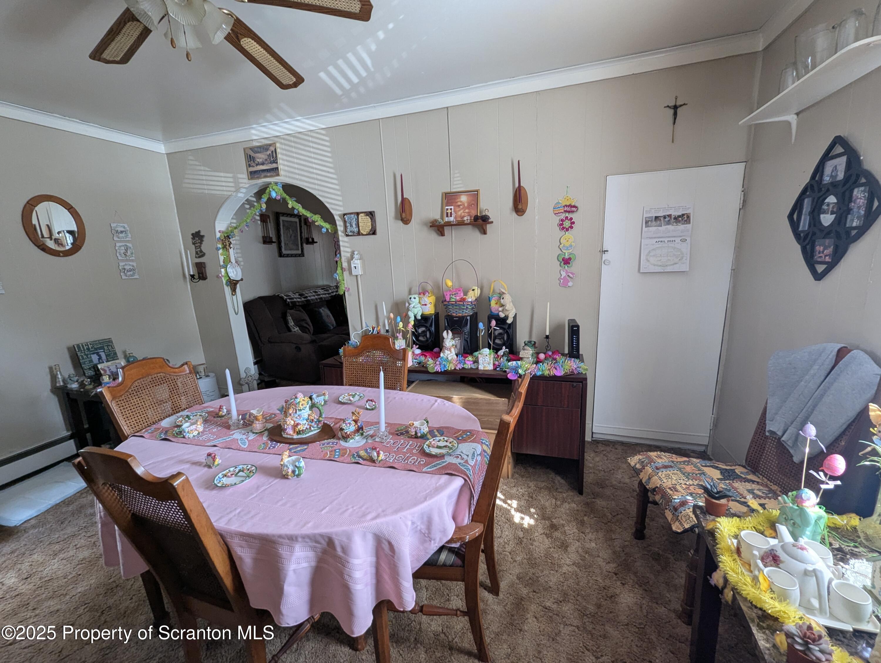 846 Capouse Avenue Scranton, PA 18509 - Photo 24 of 35 a dining room with furniture a rug and wooden floor