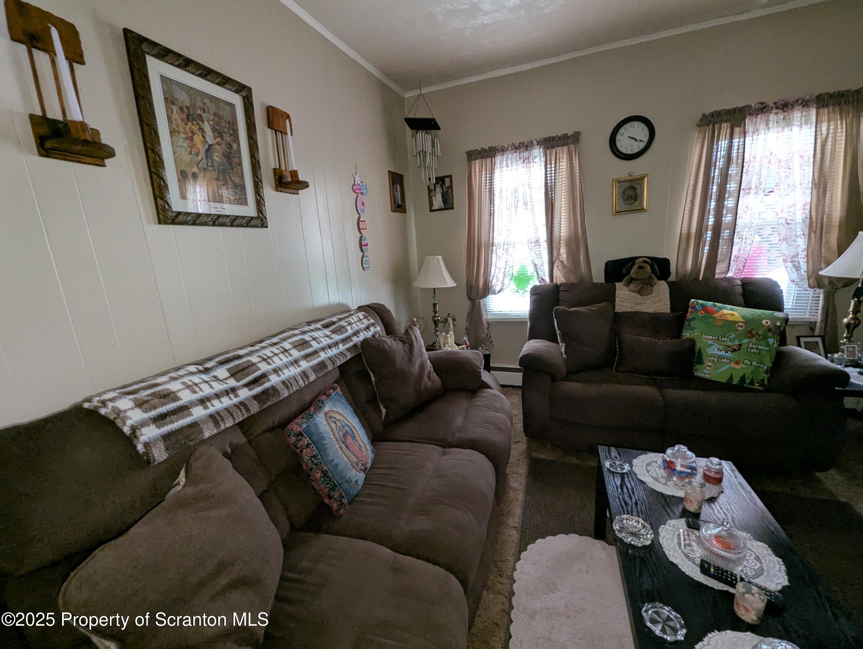 846 Capouse Avenue Scranton, PA 18509 - Photo 25 of 35 a living room with furniture and a window