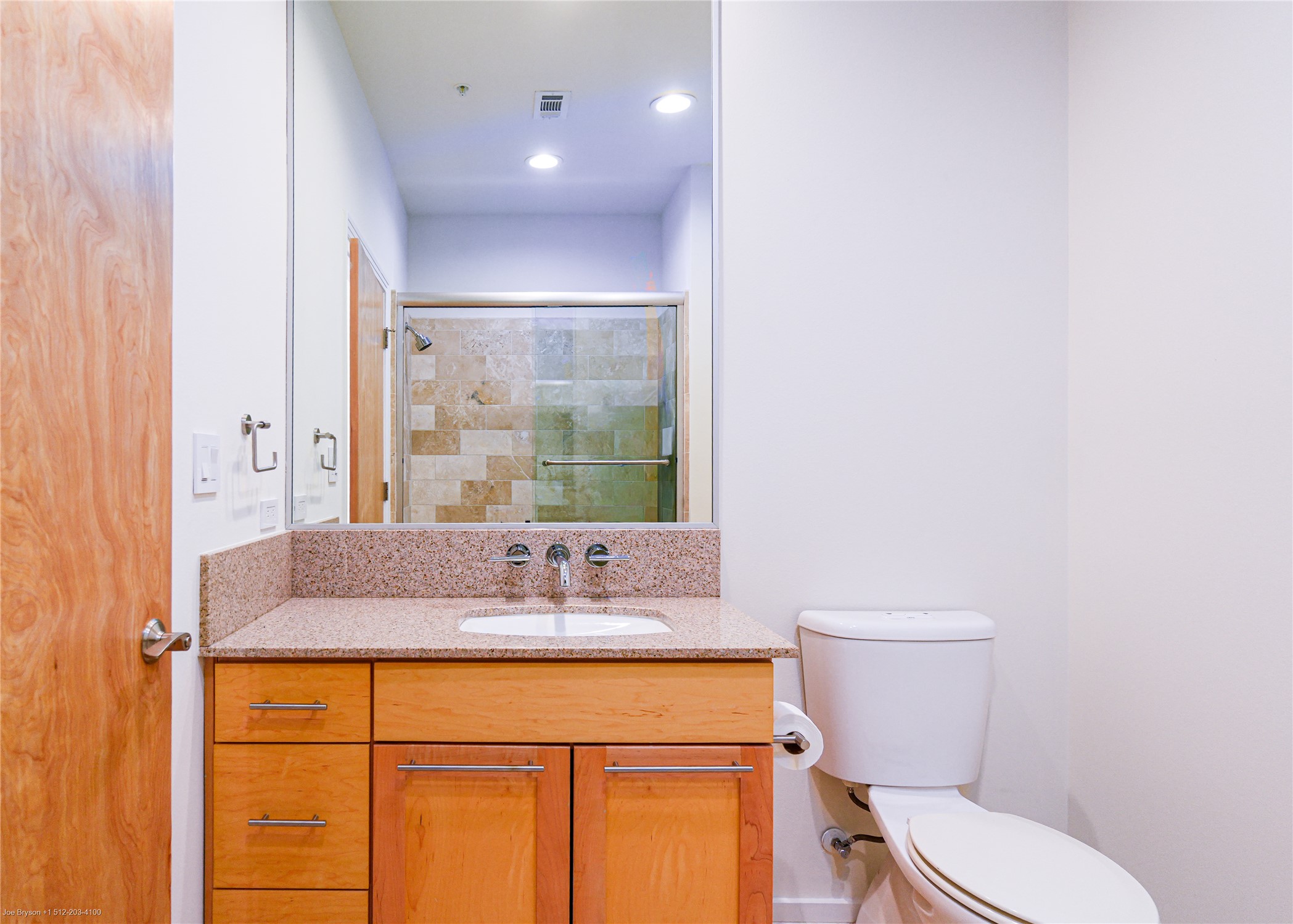 1600 Barton Springs Road, Unit 5601 Austin, TX 78704 - Photo 27 of 38 A beautifully appointed guest bath, perfectly positioned for easy access from the living areas and secondary bedroom