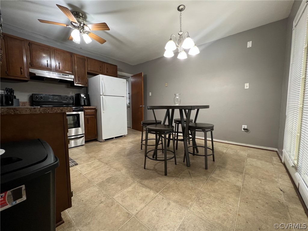 6806 Fairpines Road Chesterfield, VA 23832 - Photo 11 of 12 a view of kitchen with refrigerator stove and microwave