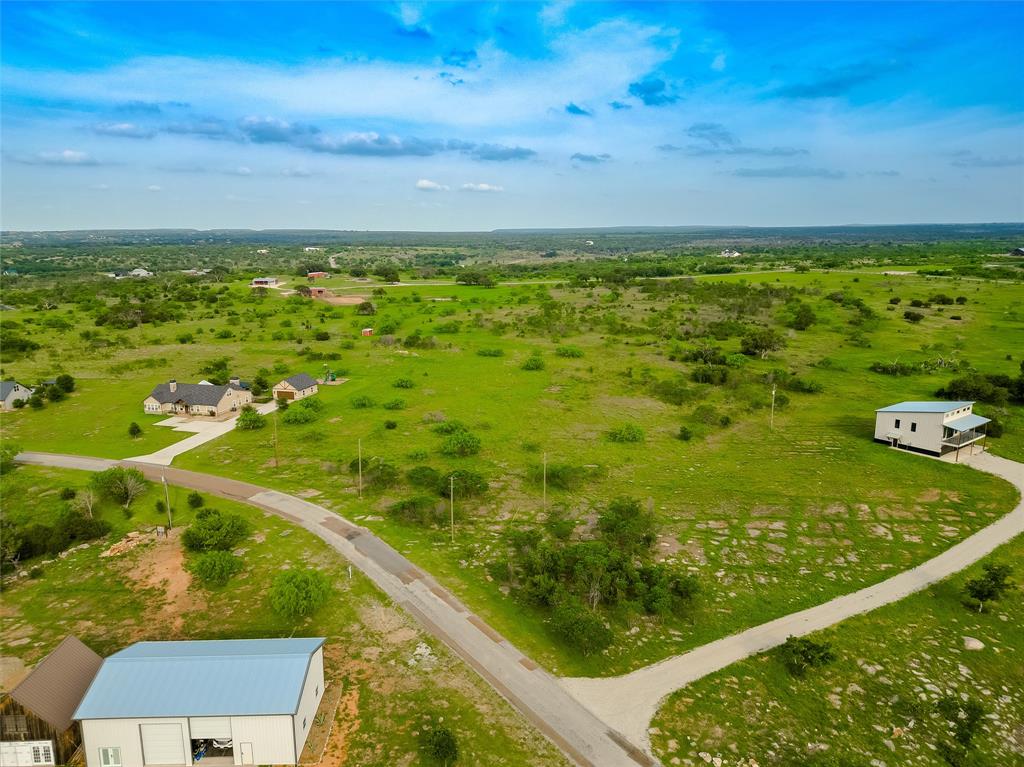4-6 Hells Gate Loop Strawn, TX 76475 - Photo 10 of 13 a view of a yard with an outdoor seating