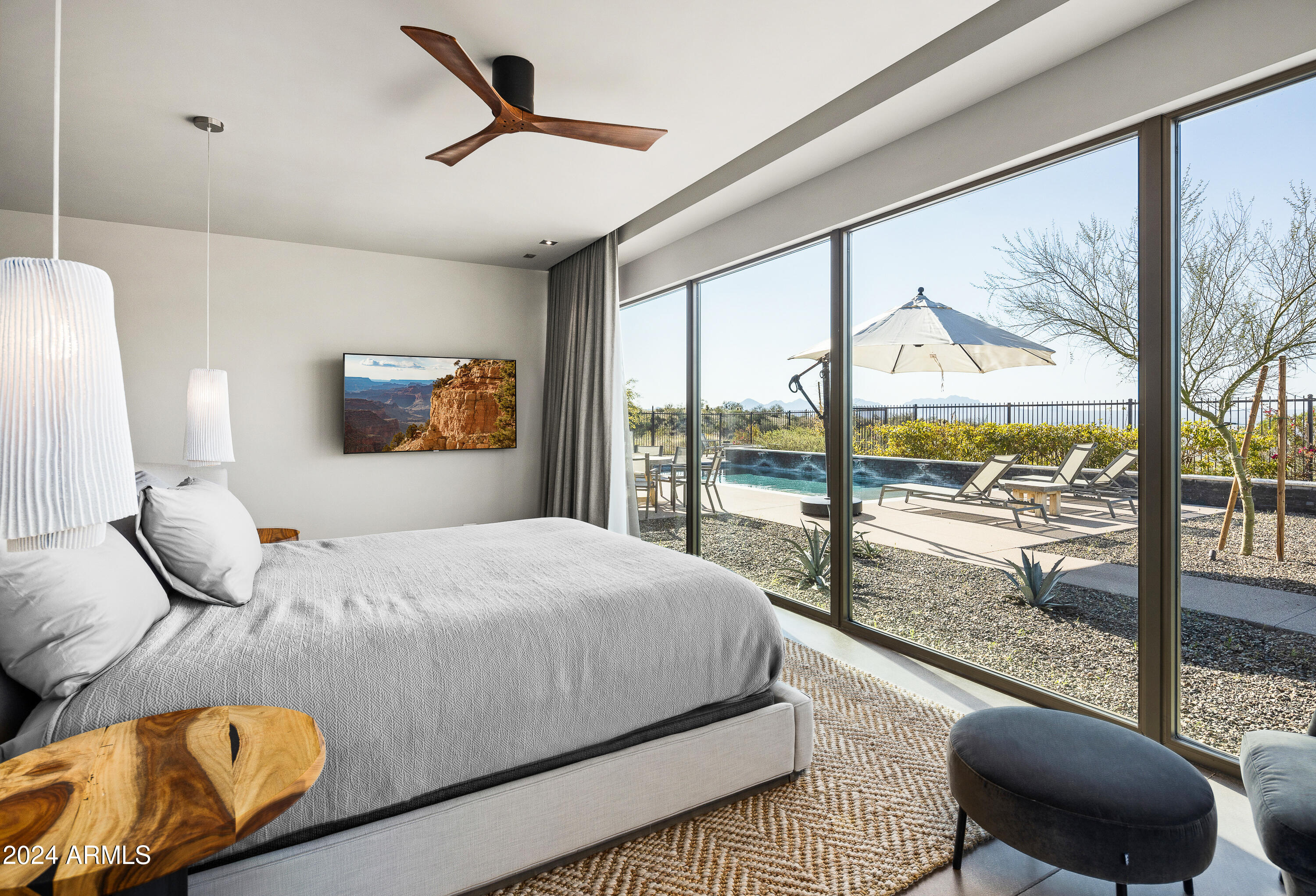 15322 North Sandy Blf Road Fort McDowell, AZ 85264 - Photo 16 of 65 a bedroom with a large bed and a balcony view