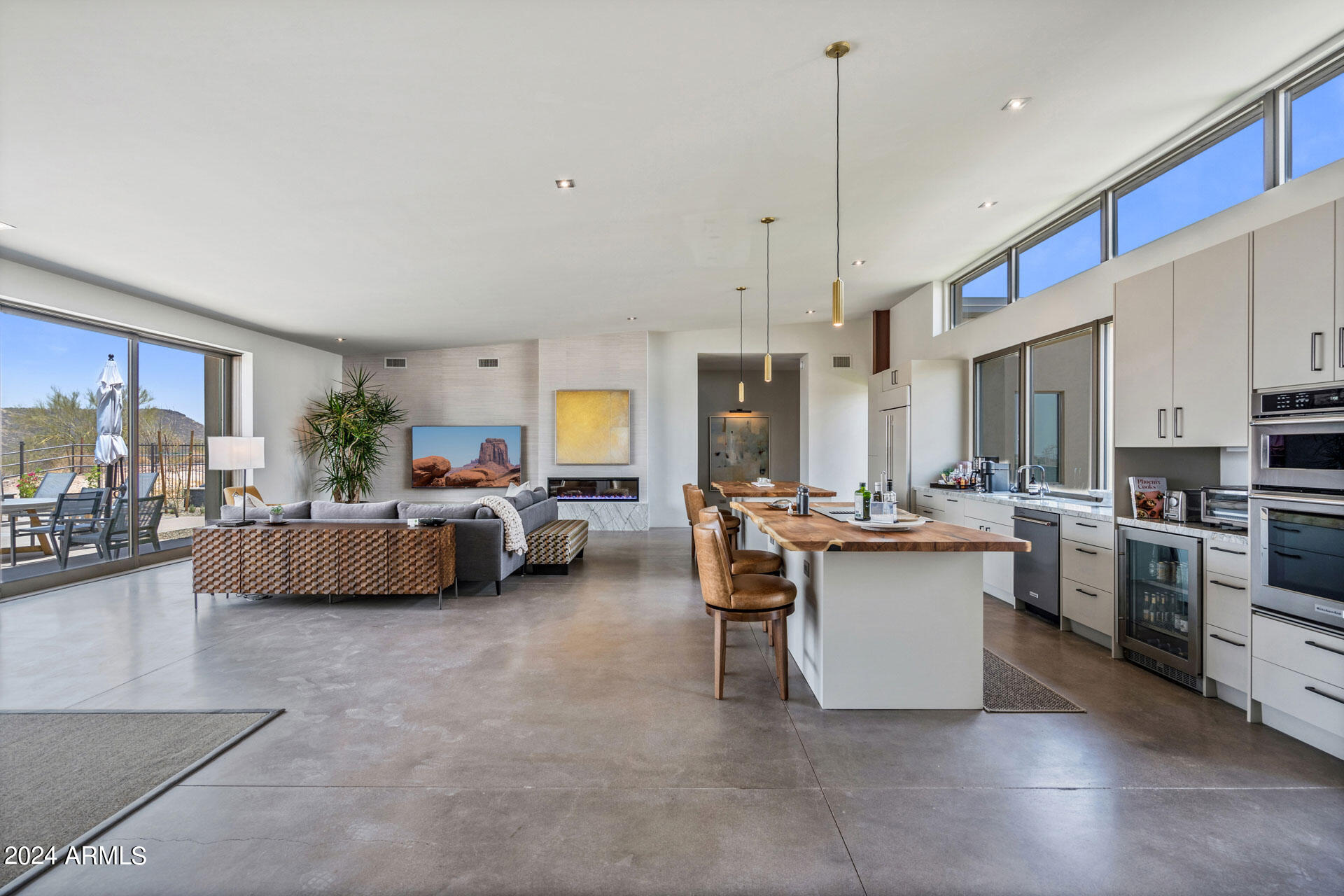 15322 North Sandy Blf Road Fort McDowell, AZ 85264 - Photo 2 of 65 a living room with furniture a window and kitchen view