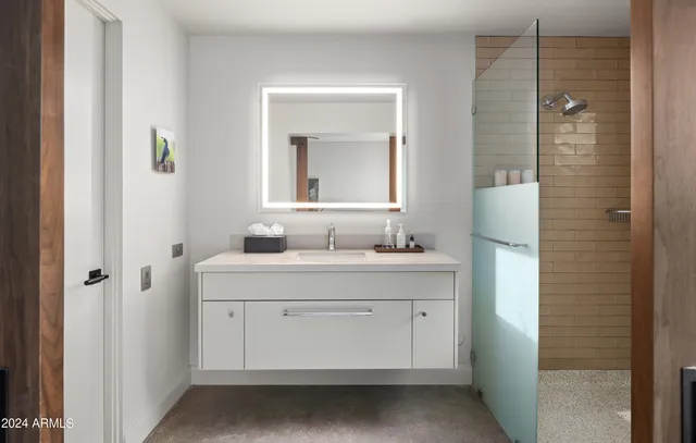 a view of a house with backyard porch and sitting area