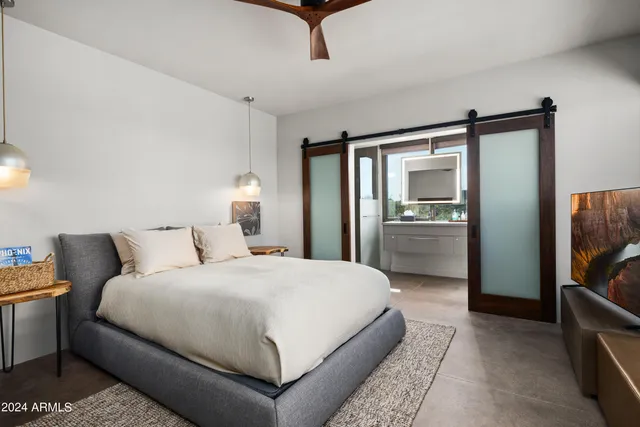 a view of a lake with couches and city view