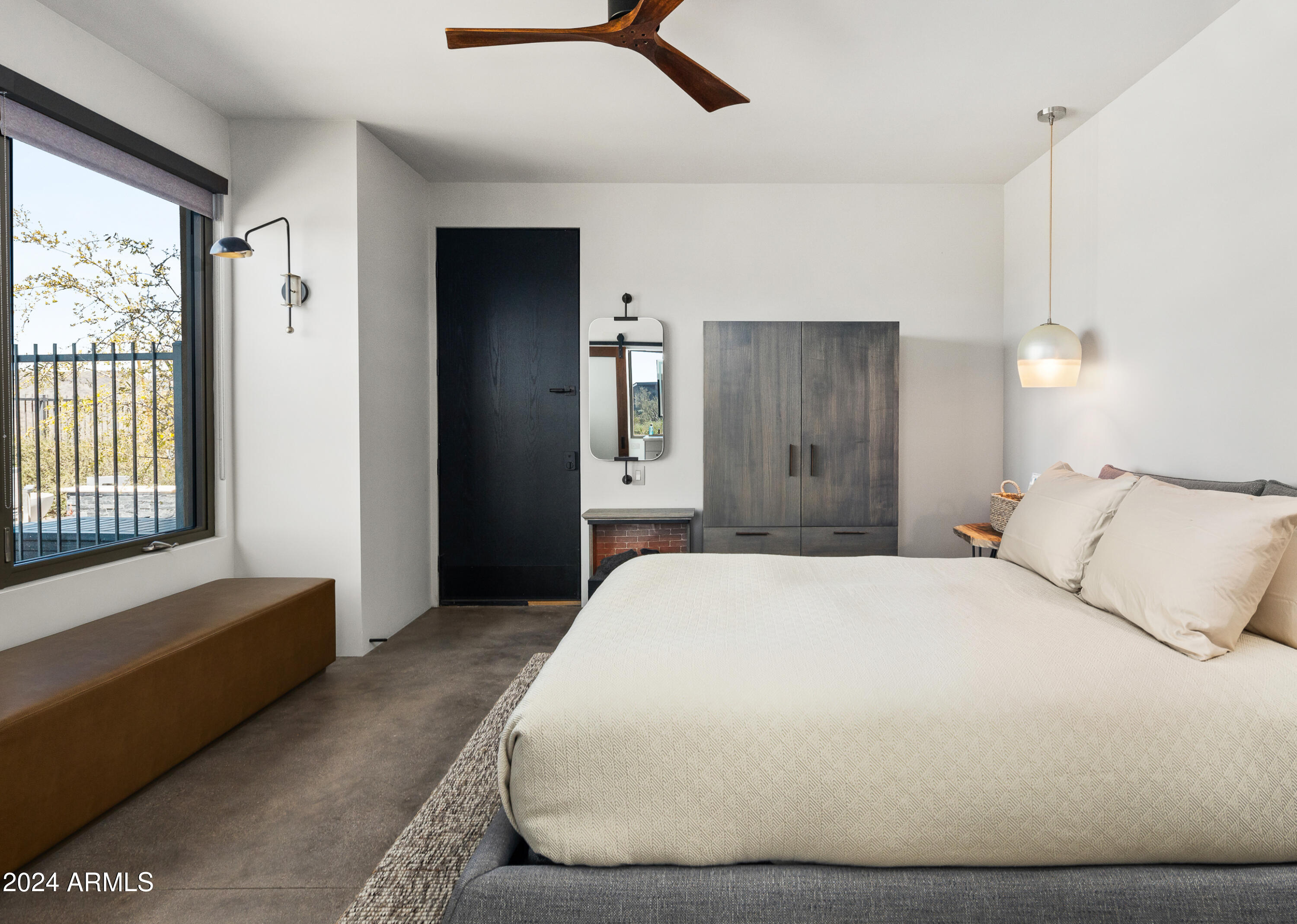 15322 North Sandy Blf Road Fort McDowell, AZ 85264 - Photo 37 of 65 a spacious bedroom with a bed and a window