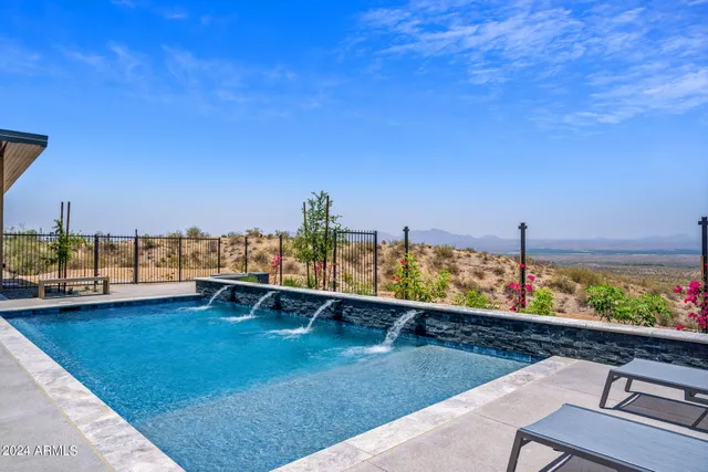 an aerial view of a house with a garden