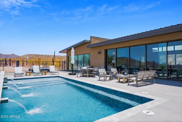 a view of a terrace with couches and a table