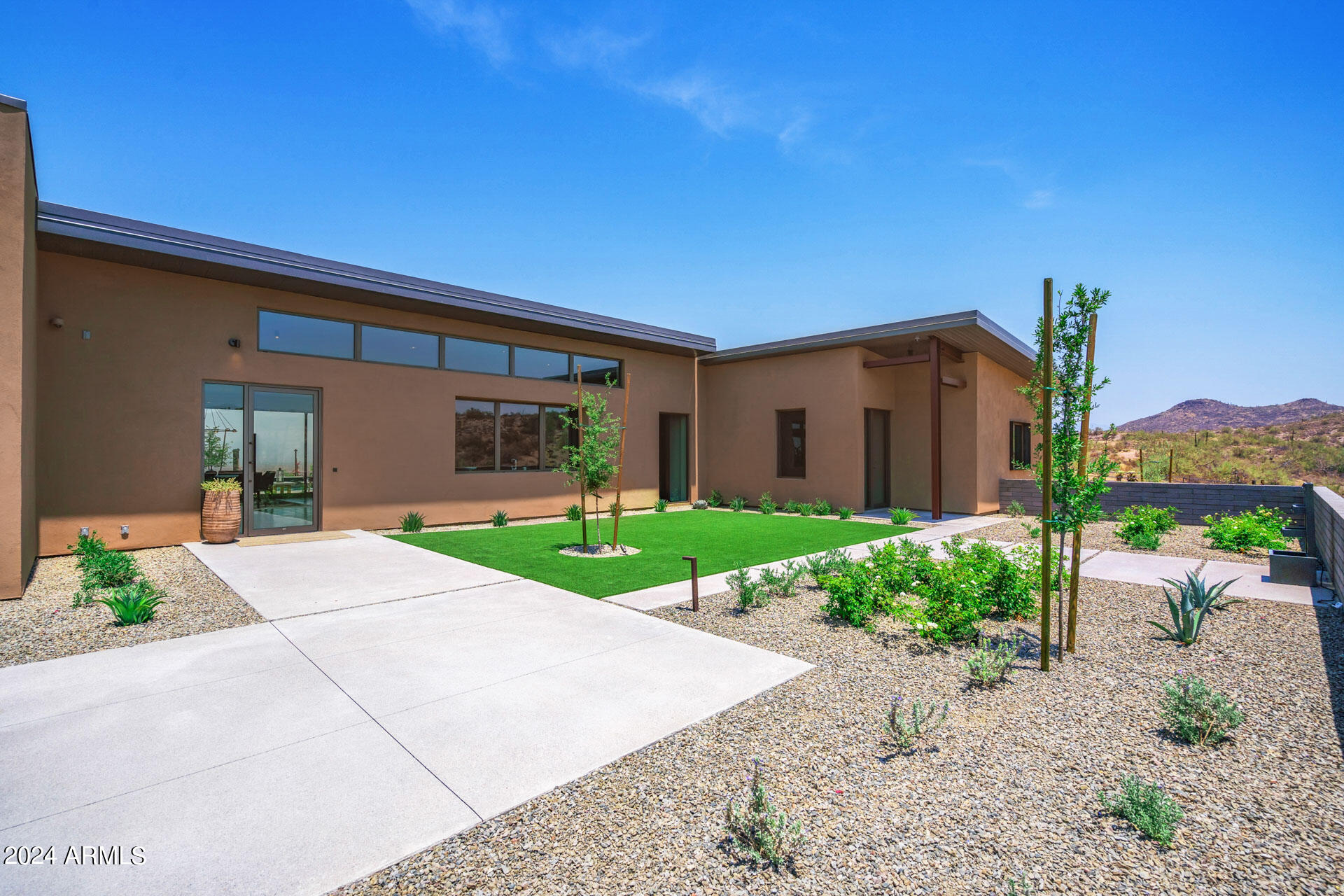 15322 North Sandy Blf Road Fort McDowell, AZ 85264 - Photo 51 of 65 a view of a house with a garden and pathway