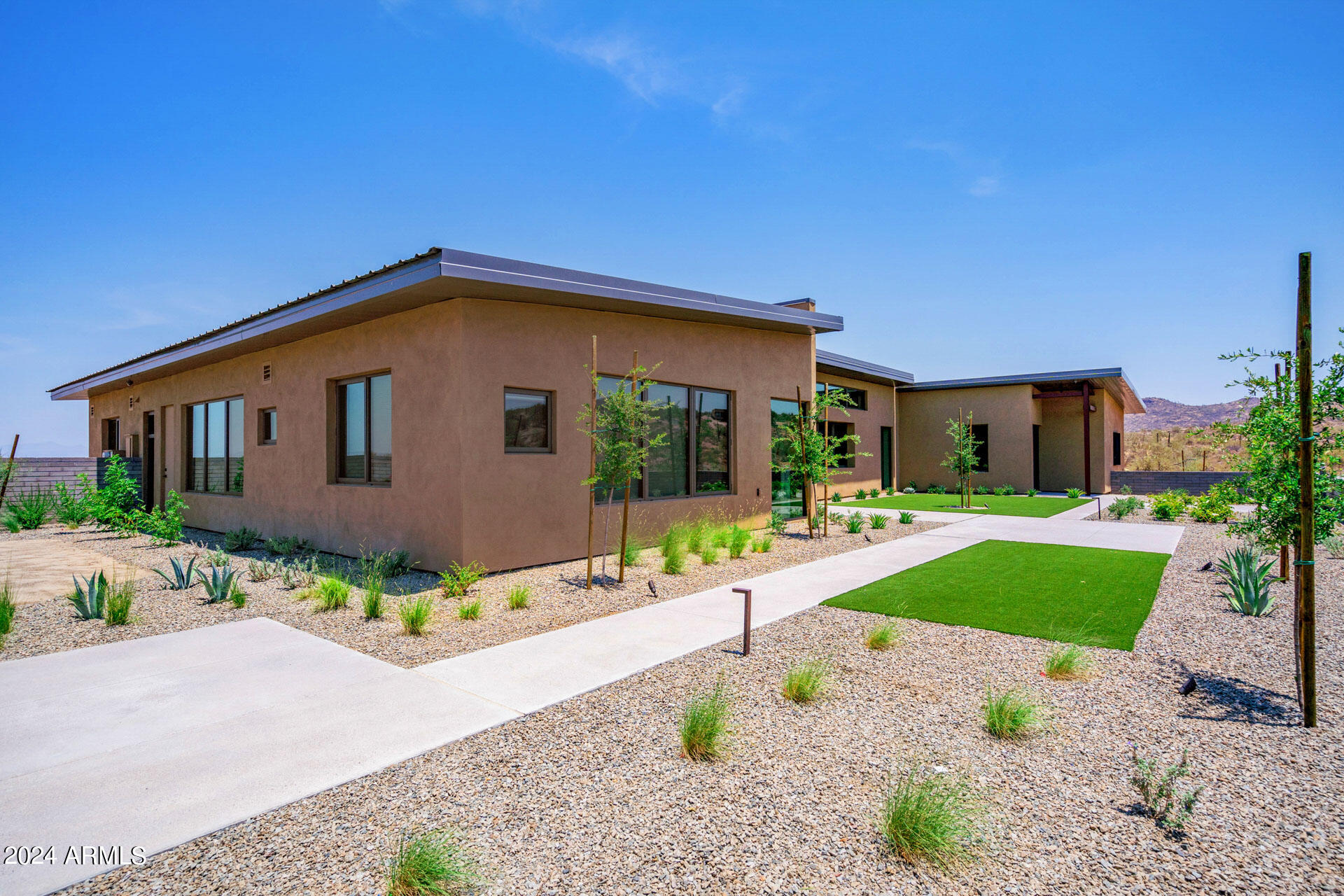 15322 North Sandy Blf Road Fort McDowell, AZ 85264 - Photo 52 of 65 a front view of a house with a yard and garage