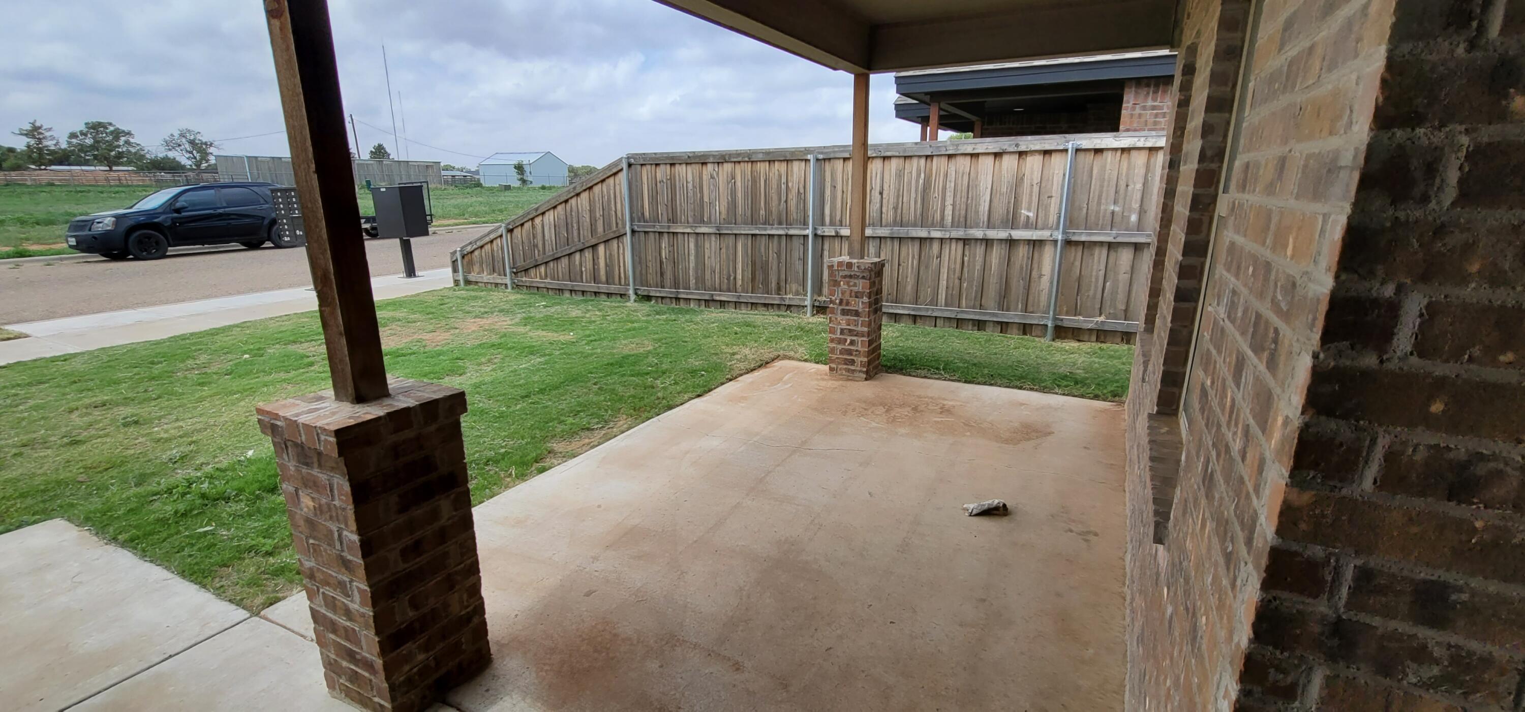 2110 88th Street Lubbock, TX 79423 - Photo 2 of 22 a view of a backyard