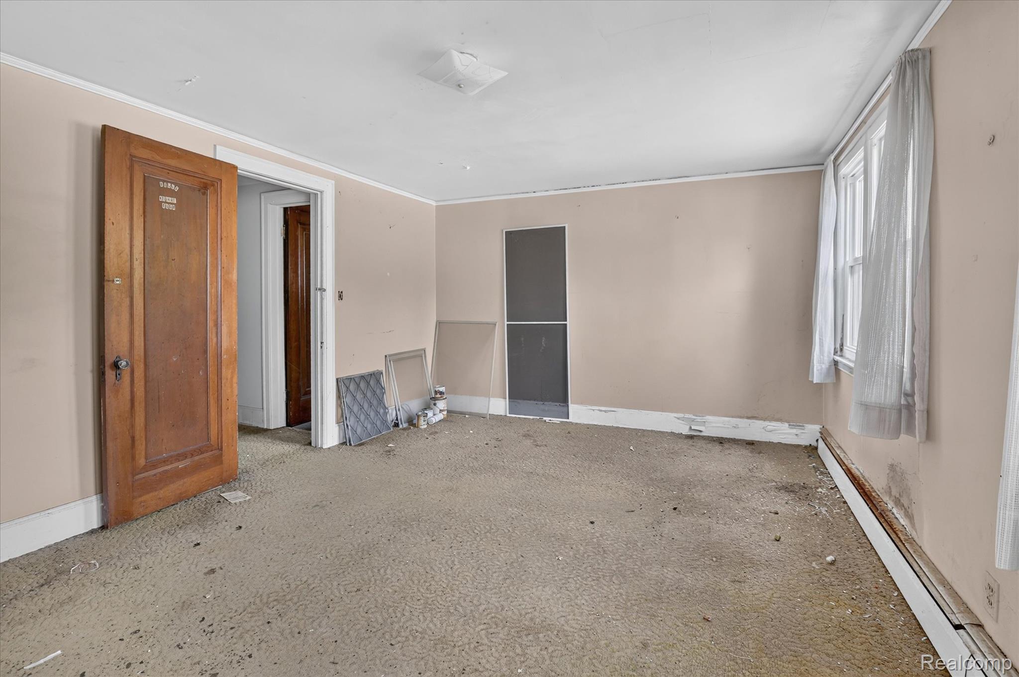 26275 Pennsylvania Road Romulus, MI 48174 - Photo 13 of 23 Interior room featuring light-colored walls and wall-to-wall carpeting