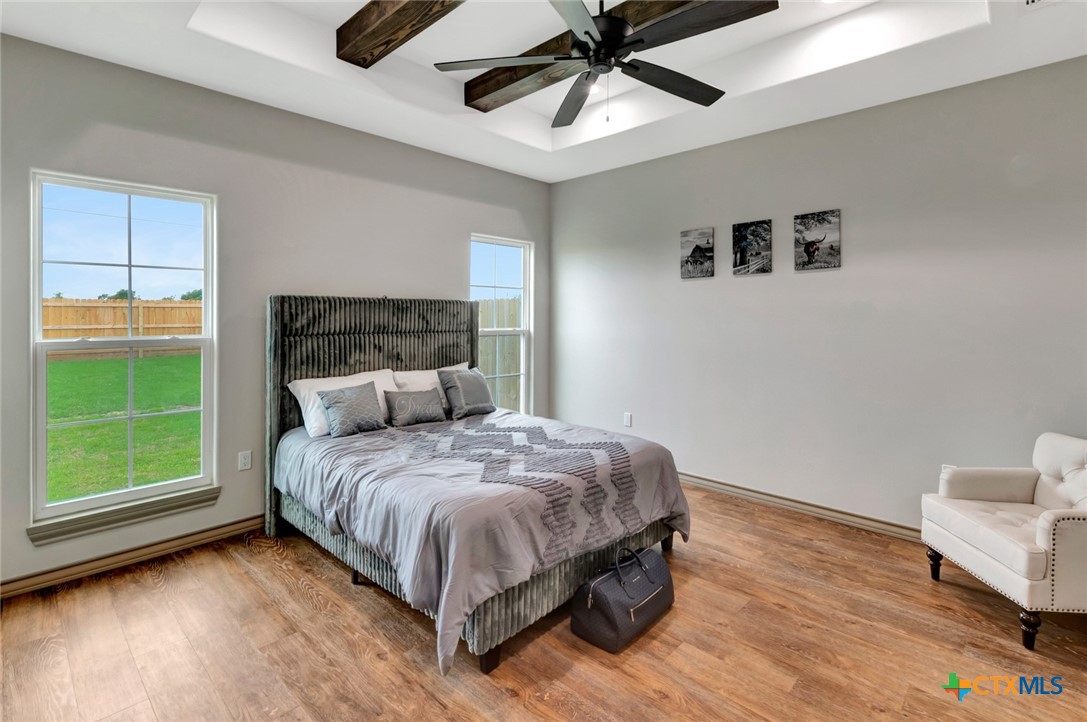 305 Turkey Lane Victoria, TX 77905 - Photo 13 of 35 a bedroom with a bed and a window