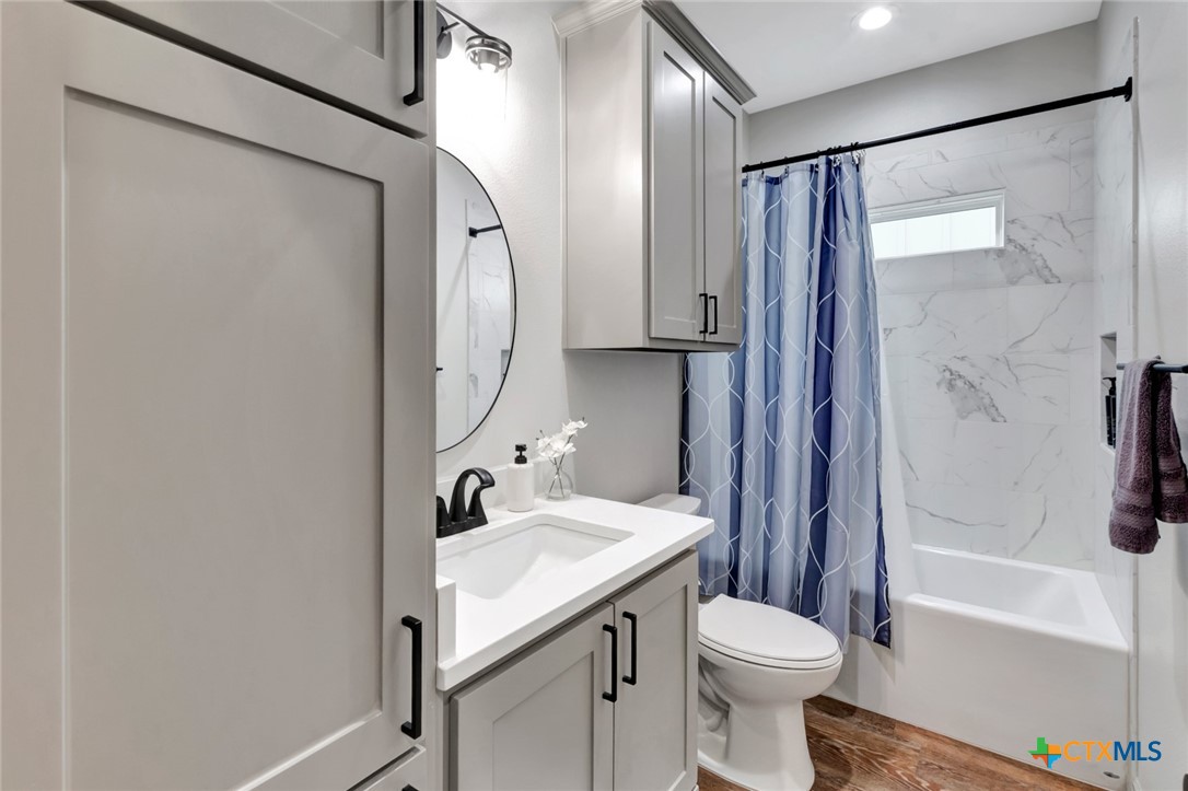 305 Turkey Lane Victoria, TX 77905 - Photo 24 of 35 a bathroom with a sink toilet and shower