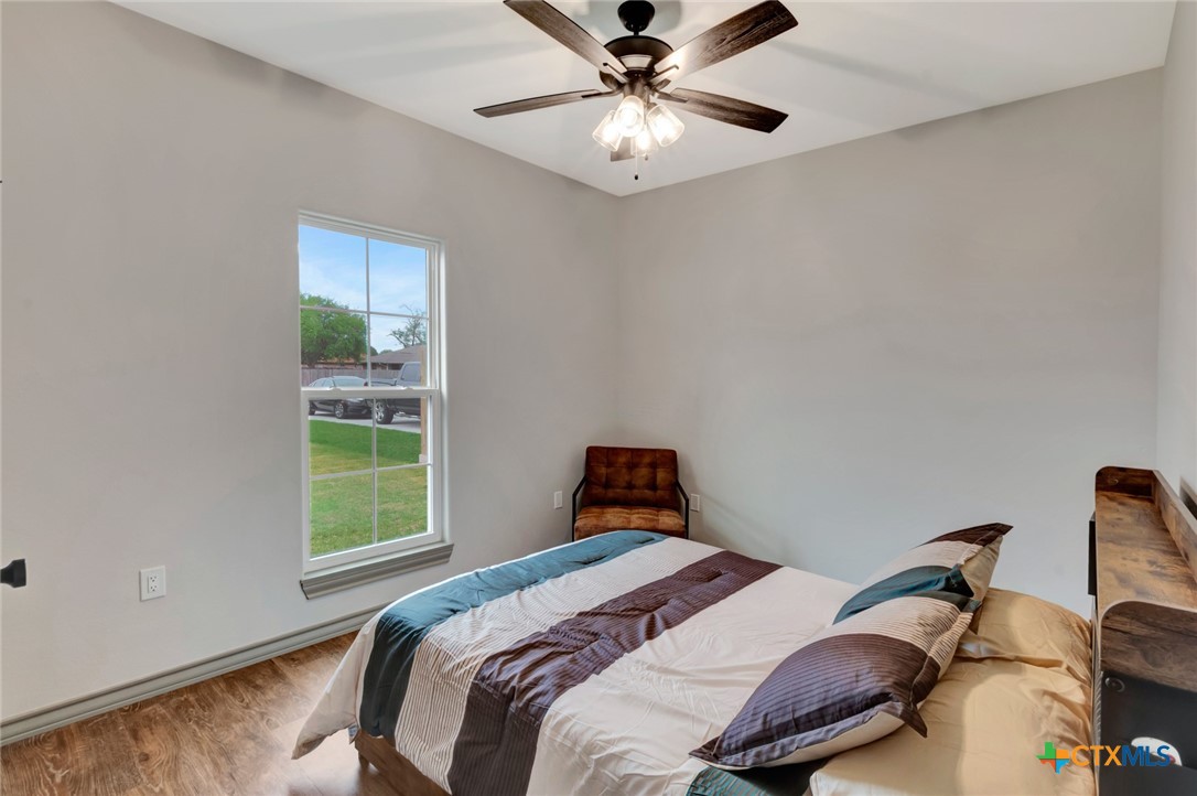 305 Turkey Lane Victoria, TX 77905 - Photo 26 of 35 a bedroom with a bed and a window