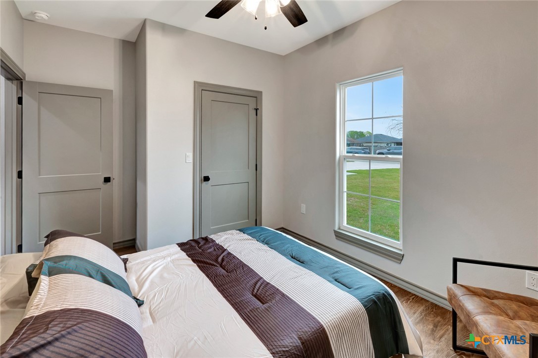 305 Turkey Lane Victoria, TX 77905 - Photo 27 of 35 a bedroom with a bed and a window
