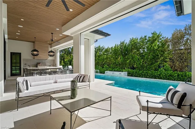 a outdoor living space with furniture and garden view