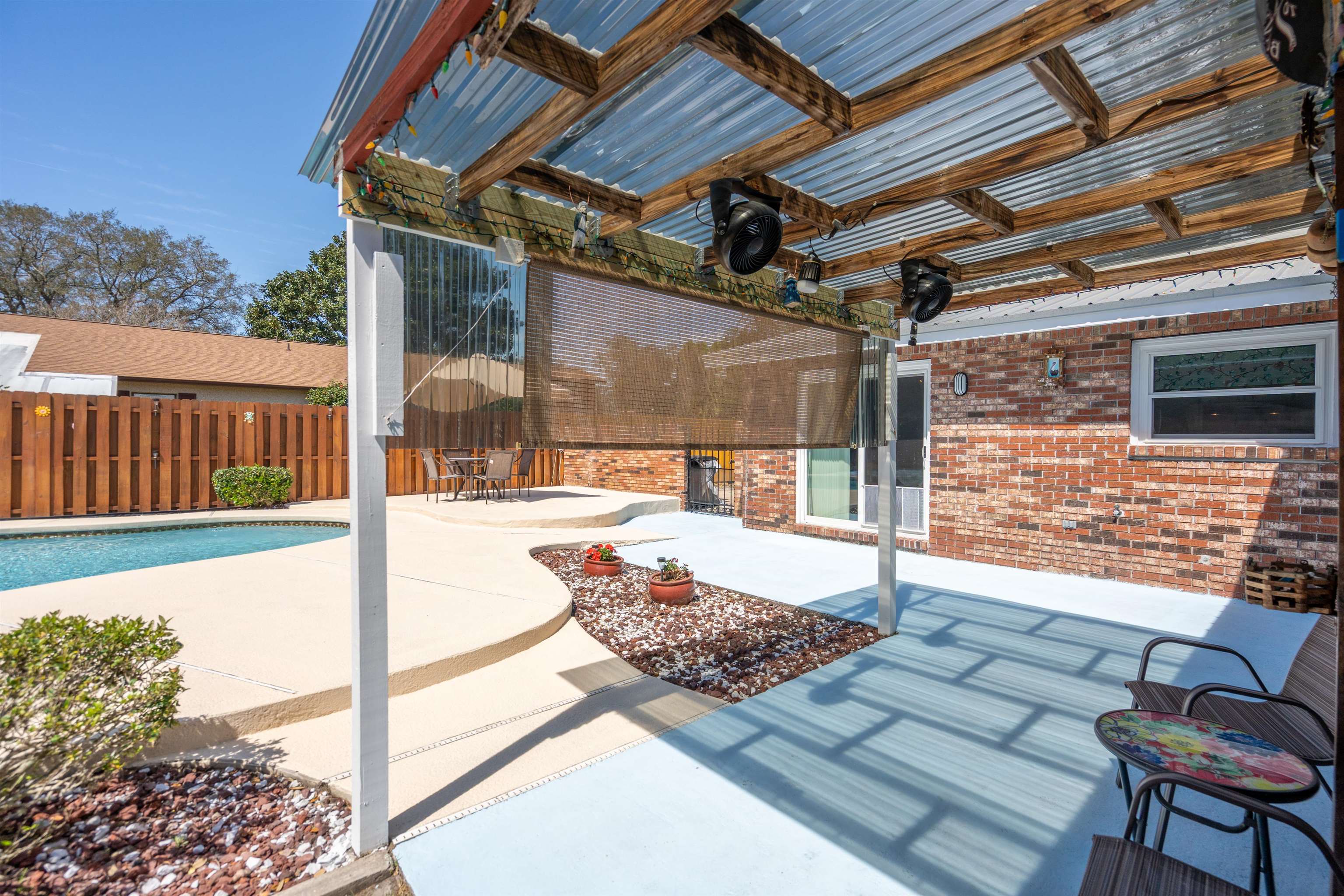 702 Queen Road St. Augustine, FL 32086 - Photo 13 of 71 a building outdoor space with patio furniture