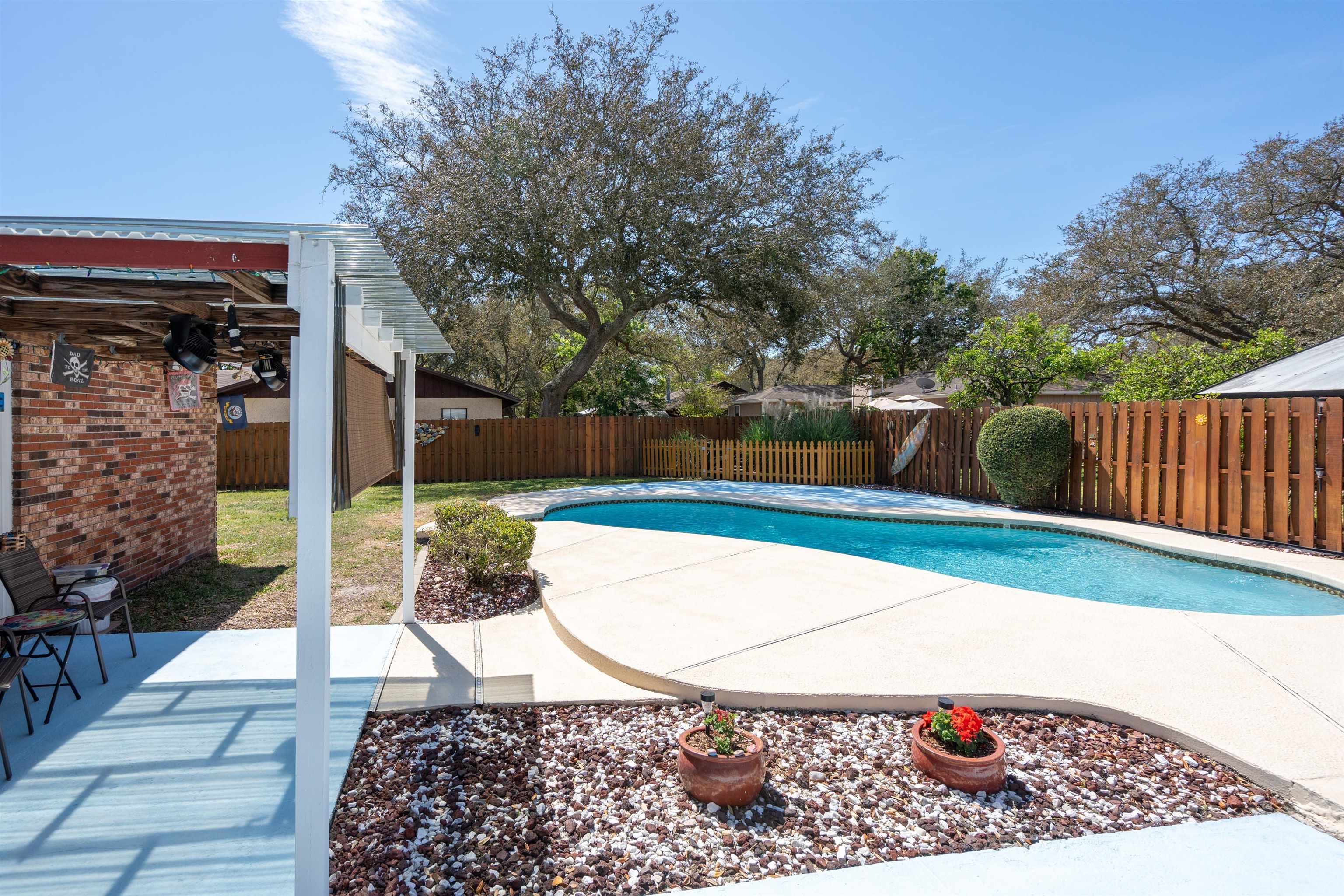 702 Queen Road St. Augustine, FL 32086 - Photo 14 of 71 a view of a chairs and tables in the patio
