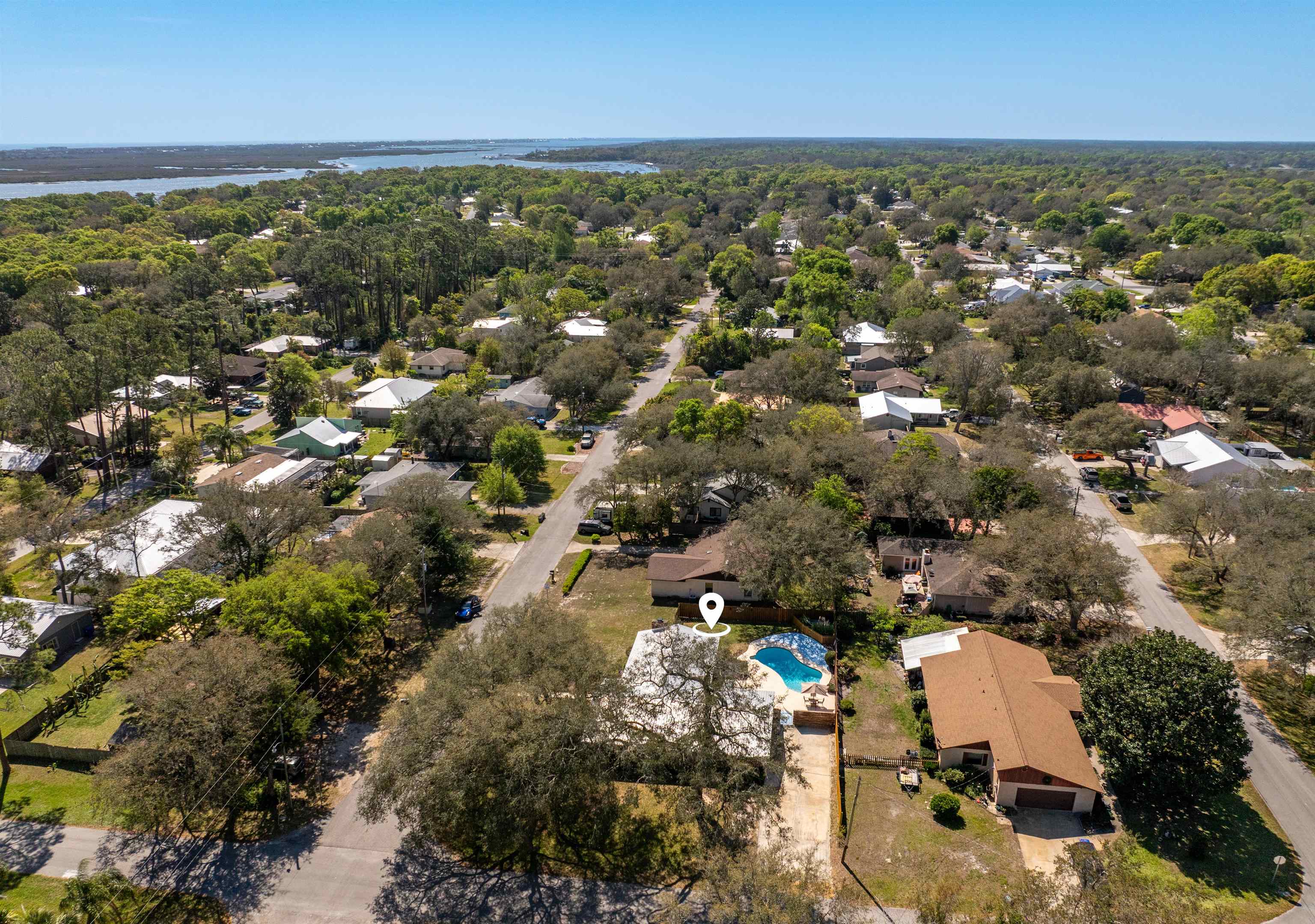 702 Queen Road St. Augustine, FL 32086 - Photo 16 of 71 an aerial view of residential building with green space