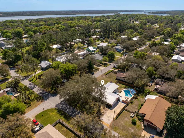 an aerial view of residential house with outdoor space