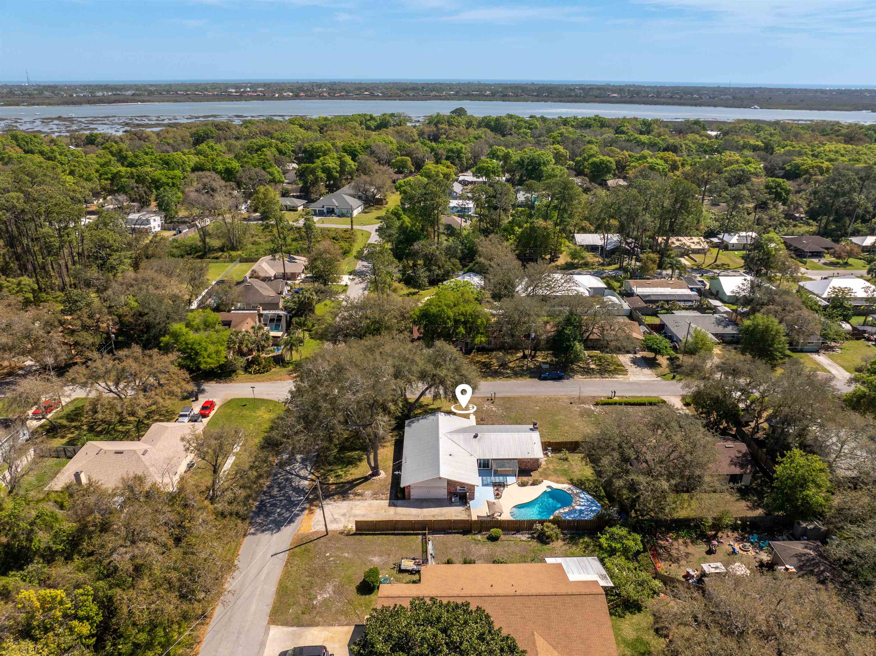 702 Queen Road St. Augustine, FL 32086 - Photo 19 of 71 an aerial view of residential houses with outdoor space and trees