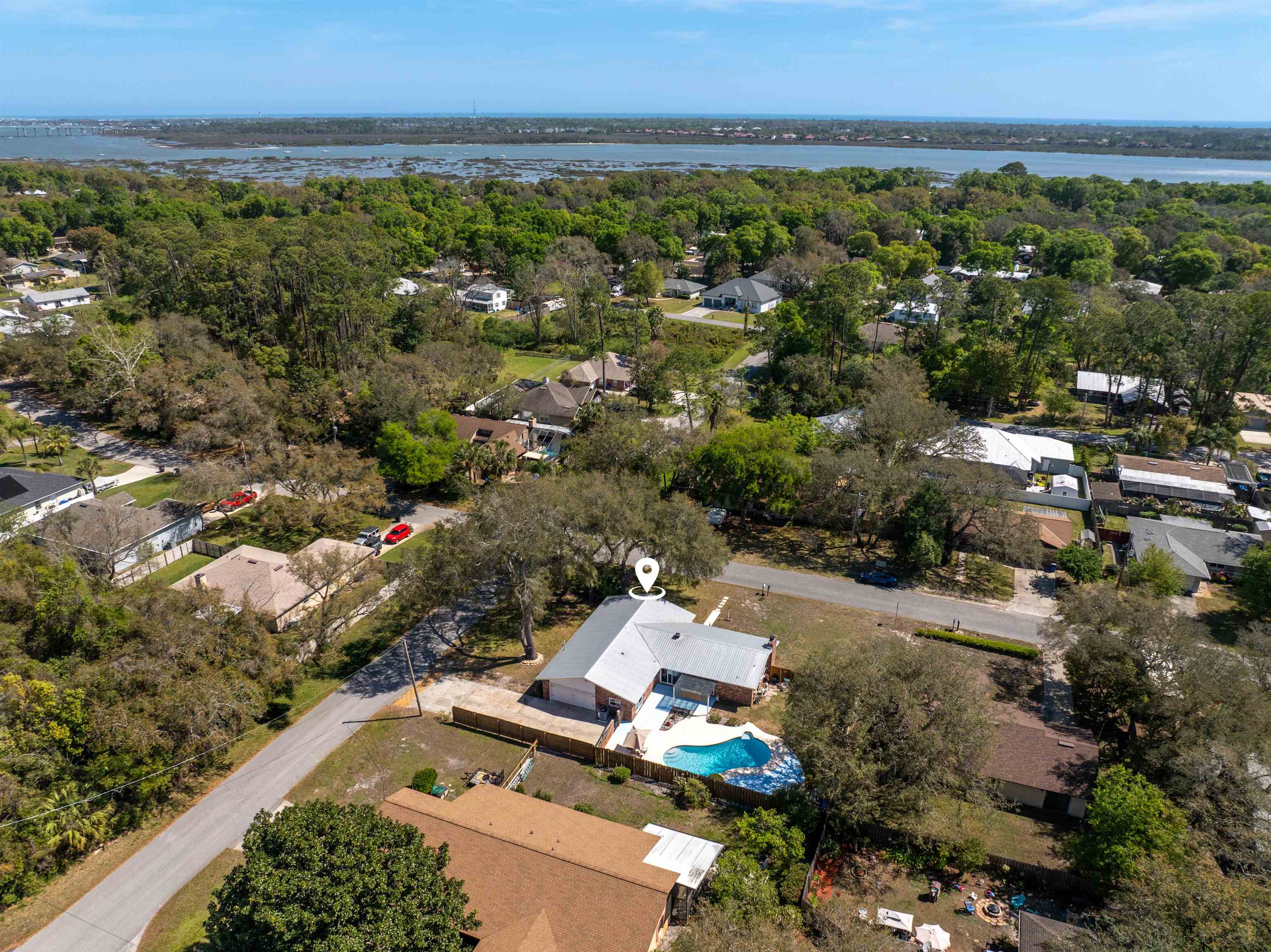 702 Queen Road St. Augustine, FL 32086 - Photo 20 of 71 an aerial view of a city with lots of residential buildings