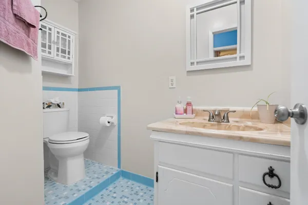 a bed room with a bed and a window