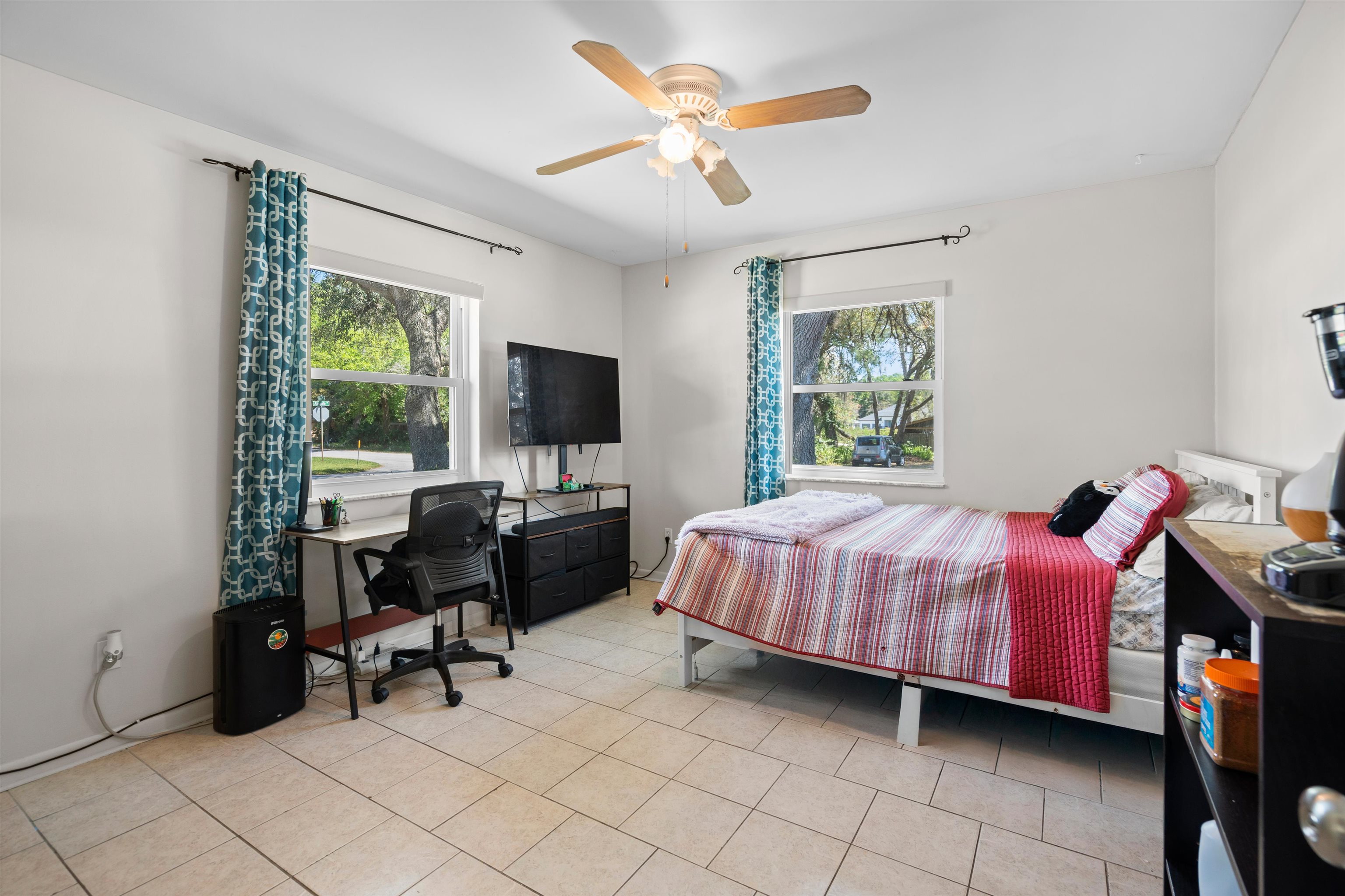 702 Queen Road St. Augustine, FL 32086 - Photo 42 of 71 a bedroom with a bed and a window