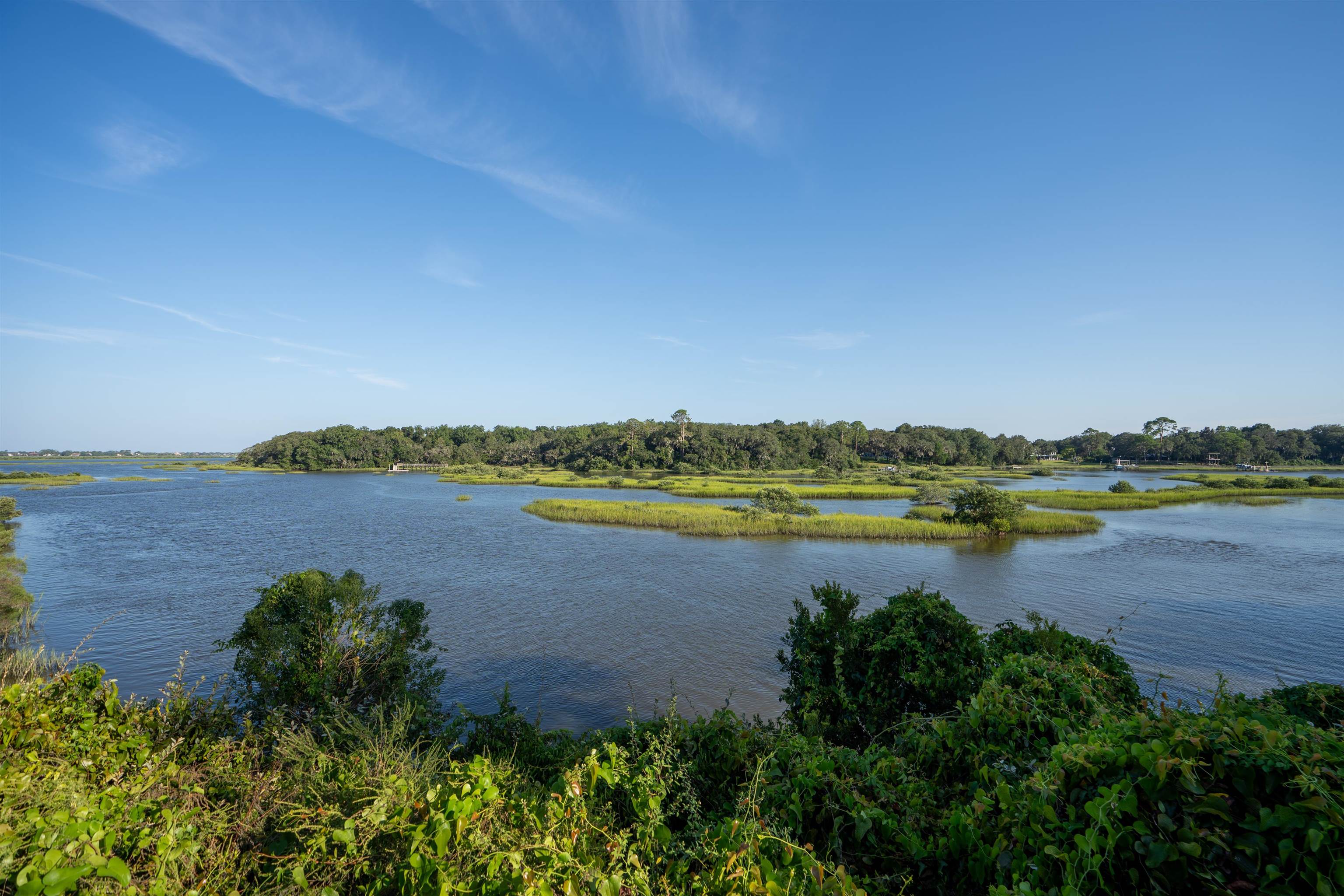 702 Queen Road St. Augustine, FL 32086 - Photo 53 of 71 a view of a lake with a city