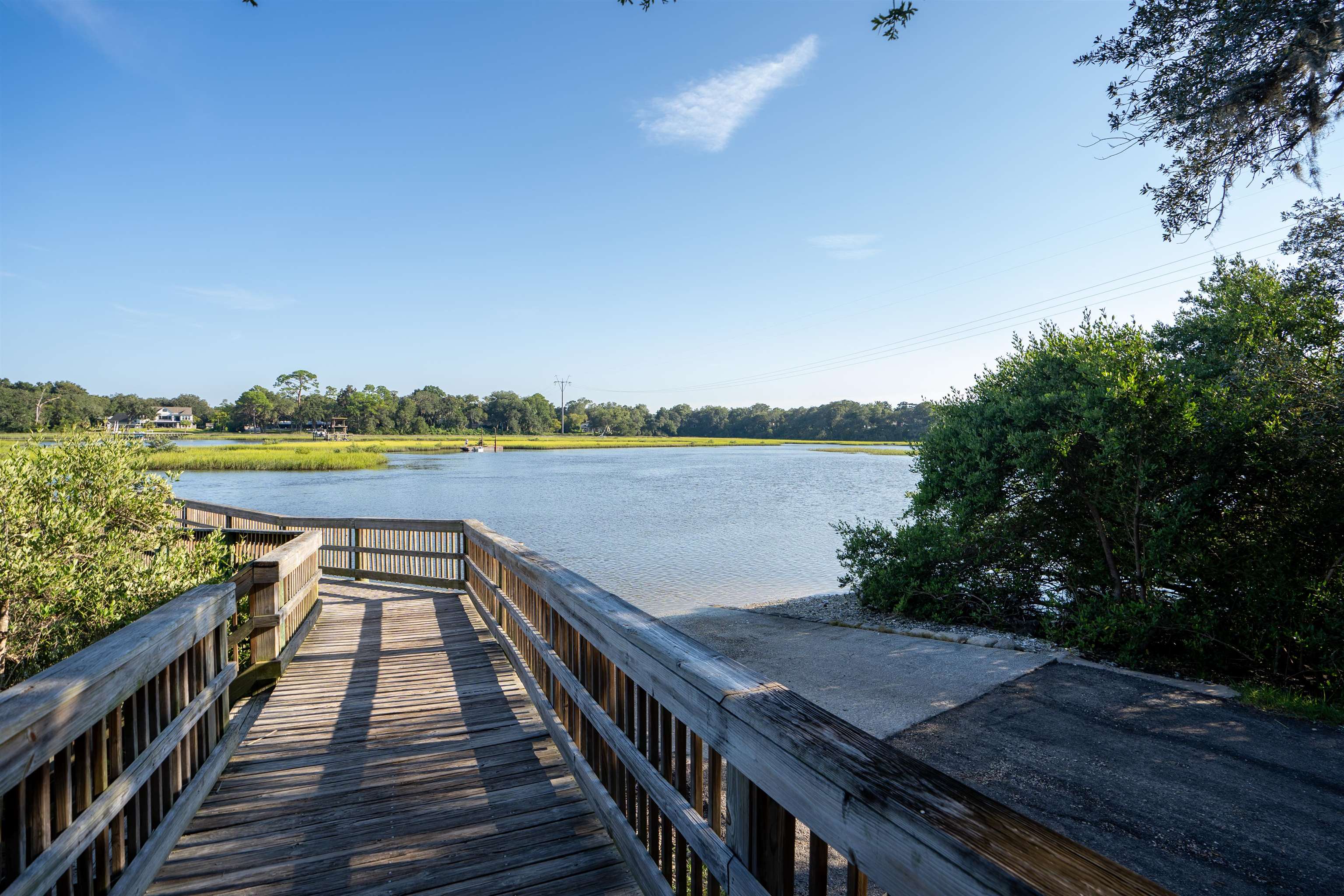 702 Queen Road St. Augustine, FL 32086 - Photo 57 of 71 a view of a balcony with wooden floor and lake view