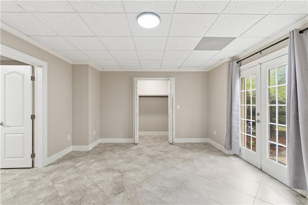 122 Ridge View Drive Ball Ground, GA 30107 - Photo 57 of 84 a view of an empty room with a window