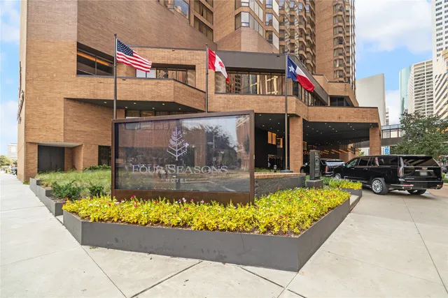 a view of a building with sitting area