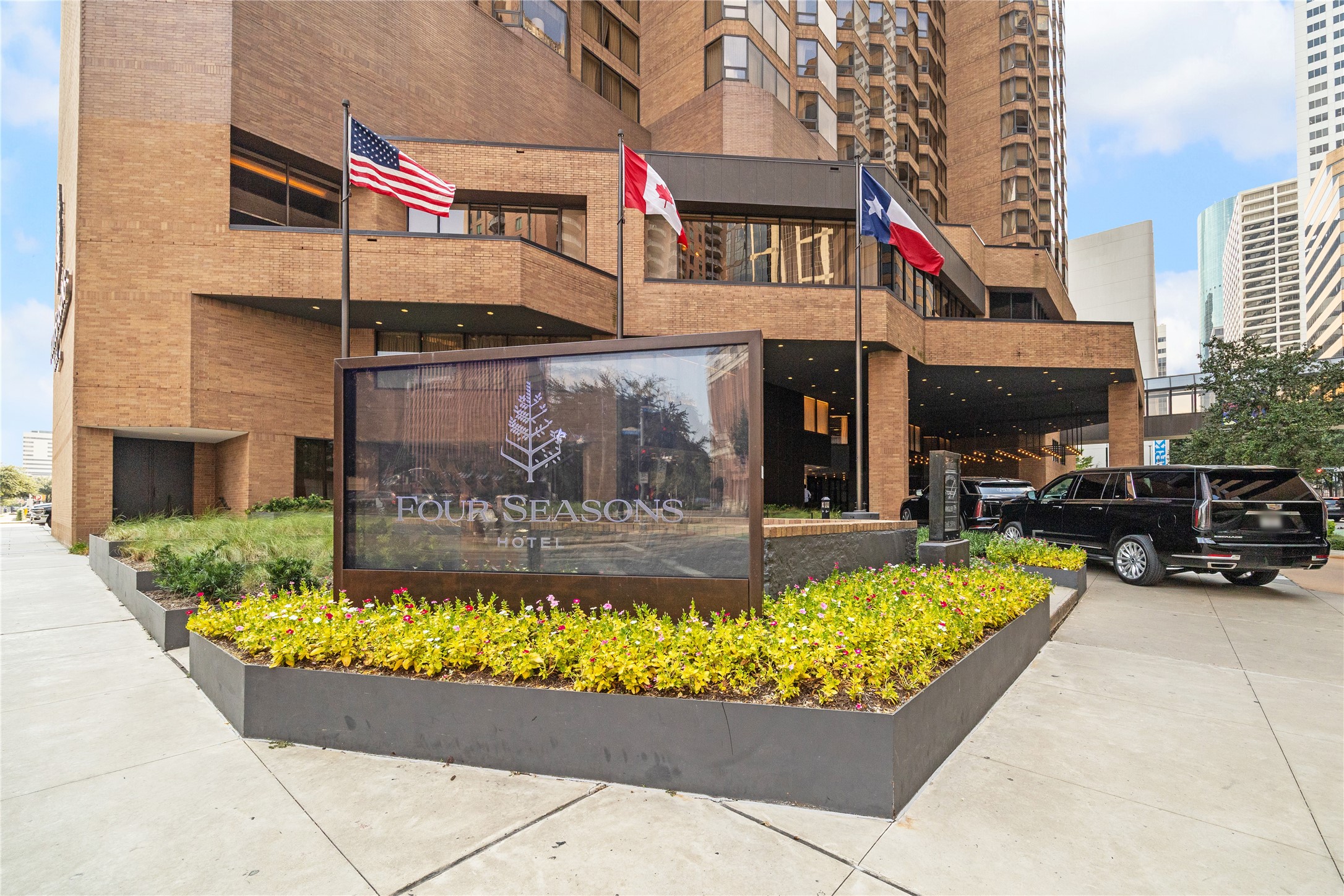 a view of a building with sitting area