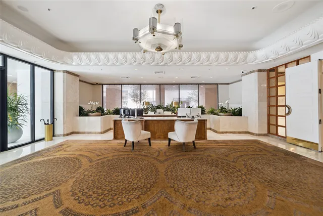 a dining table with chairs and wooden floor