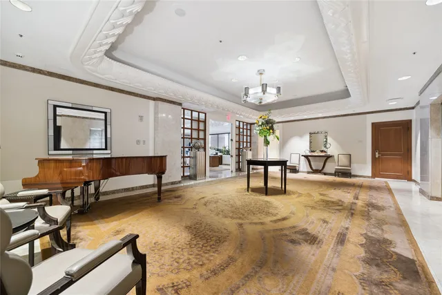a living room with fireplace furniture and a flat screen tv