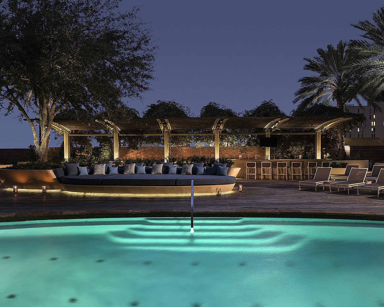 1111 Caroline Street, Unit 2908 Houston, TX 77010 - Photo 34 of 50 a front view of a house with garden and trees