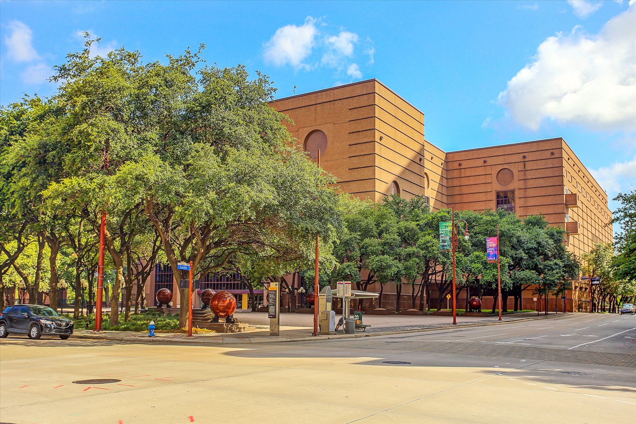 1111 Caroline Street, Unit 2908 Houston, TX 77010 - Photo 45 of 50 The Wortham Theater Center is a cornerstone of Houston’s Theater District, home to the Houston Ballet and Houston Grand Opera. Its bold architecture and tree-shaded plaza with distinctive spherical sculptures create an instantly recognizable landmark along Texas Avenue. Just beyond its walls, residents enjoy walkable access to concerts, Broadway shows, and world-class performances, making this cultural hub an essential part of downtown’s vibrant lifestyle.