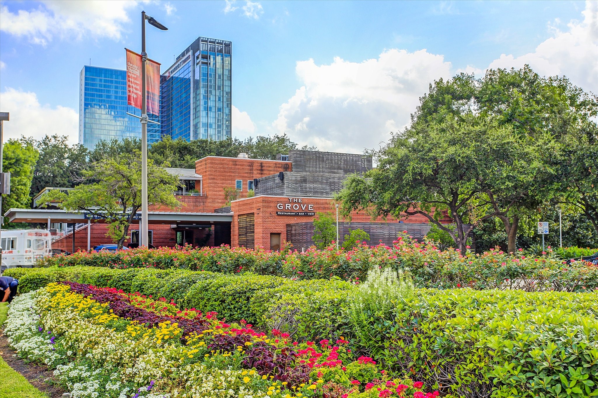 1111 Caroline Street, Unit 2908 Houston, TX 77010 - Photo 49 of 50 a view of a house with a yard and garden