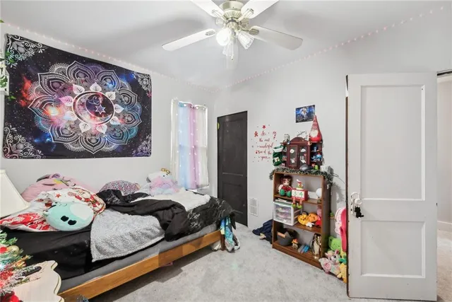 a bedroom with furniture and a bed