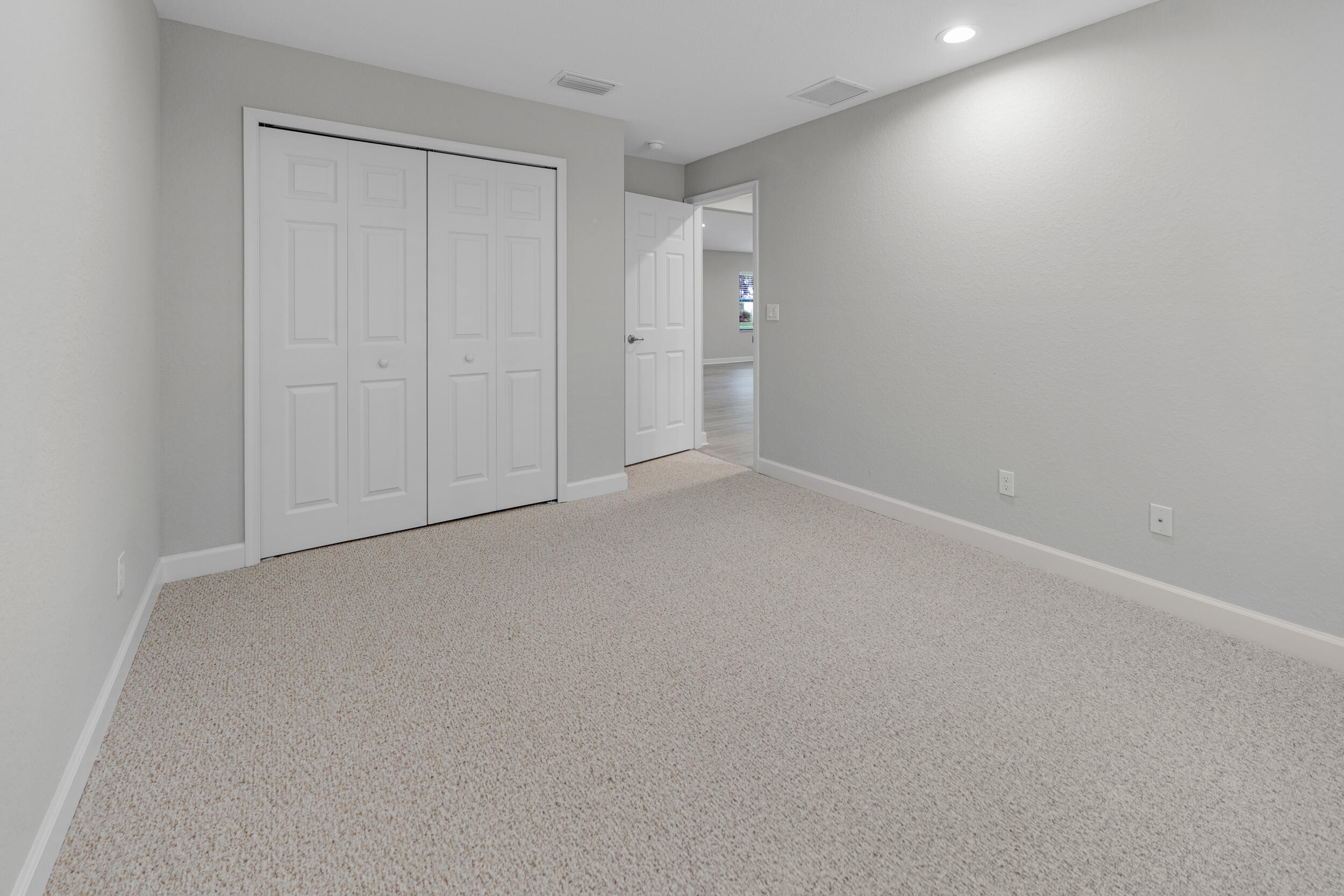 14533 Dulce Real Avenue Fort Pierce, FL 34951 - Photo 24 of 42 an empty room with closet area