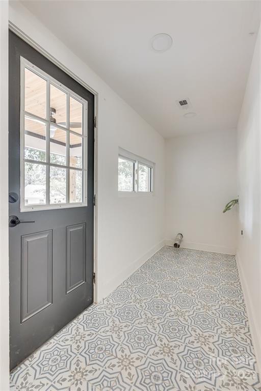 1321 Enderly Road Charlotte, NC 28208 - Photo 14 of 26 a view of an empty room with a window