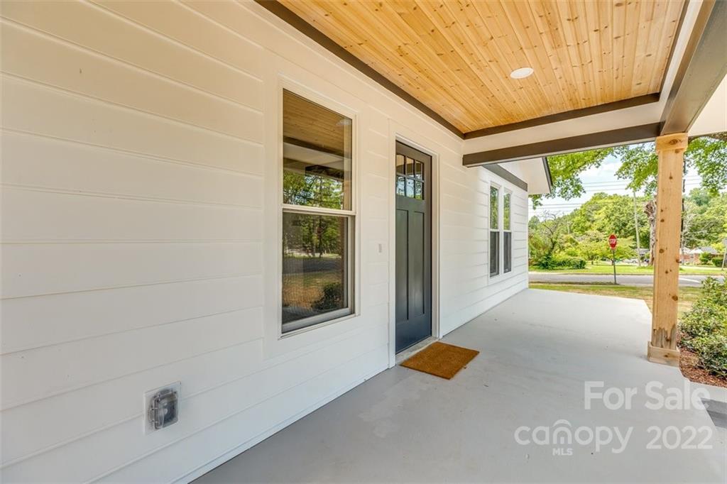 1321 Enderly Road Charlotte, NC 28208 - Photo 2 of 26 a bathroom with a window and a shower