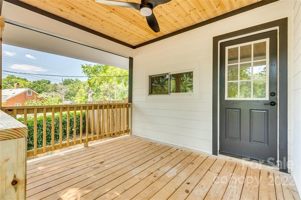 1321 Enderly Road Charlotte, NC 28208 - Photo 24 of 26 a view of backyard with wooden floor and fence