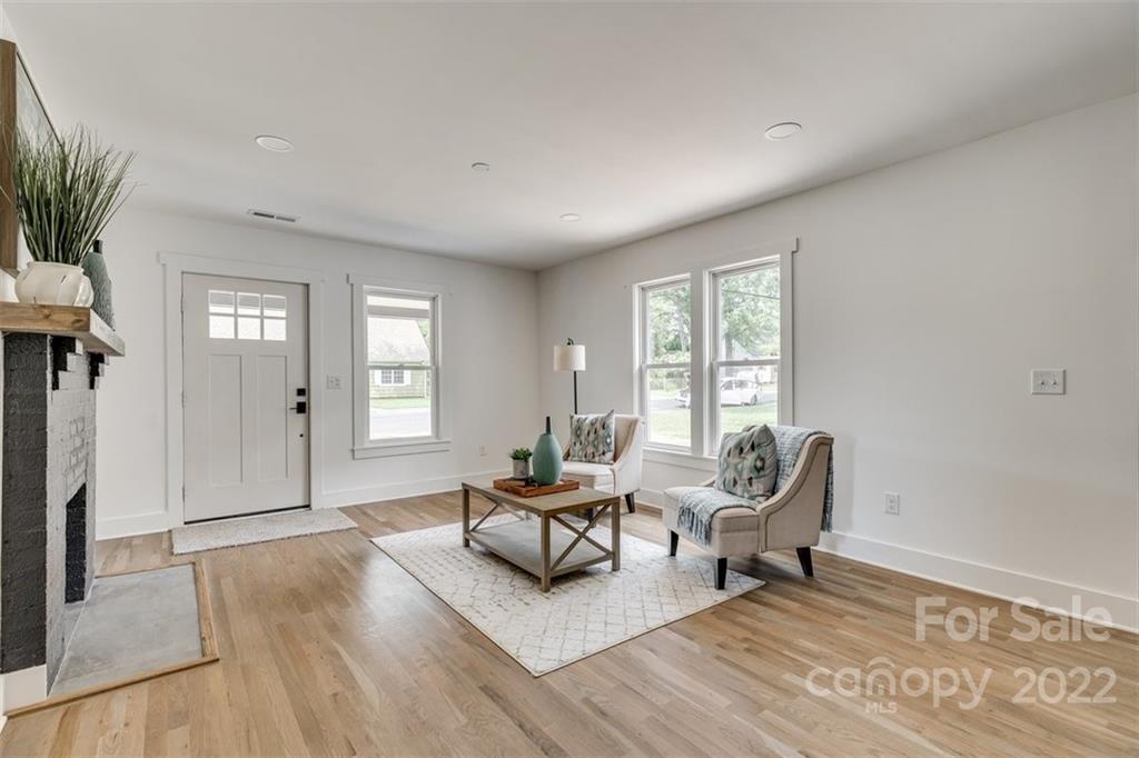 1321 Enderly Road Charlotte, NC 28208 - Photo 4 of 26 a living room with furniture and wooden floor